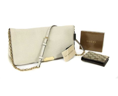 A Burberry Mildenhall shoulder bag, gold tone hardware, gold tone chain and leather strap, pressed catch closure opening to i