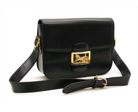 A Celine 'horse carriage box' shoulder bag, slip closure, single flat shoulder strap, gold tone hardware and catch, opening t