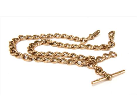 A 9ct gold curb link double Albert chain, by S Blanckensee &amp; Sons Ltd., with T-bar and two swivel clasps. Birmingham 1900