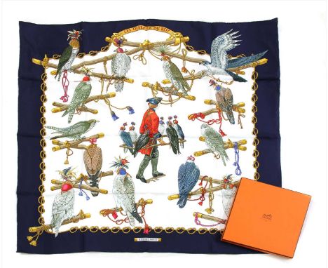 An Hermès scarf, 'Les Oiseaux du Roy', by Caty Latham, white ground with blue border, depicting birds of prey, boxed, 90cm