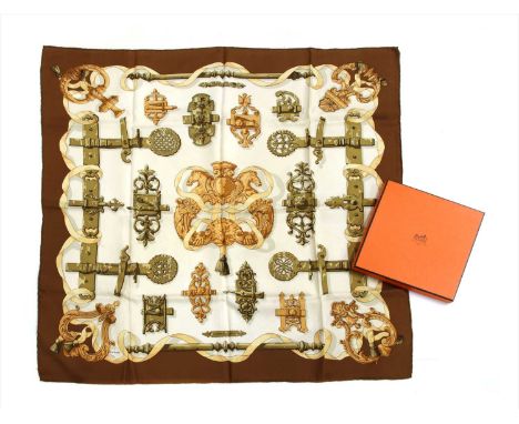 A vintage Hermès Scarf, 'Ferronnerie', by Caty Latham, 1973, C. de Savigny, cream ground with brown border, traditional desig