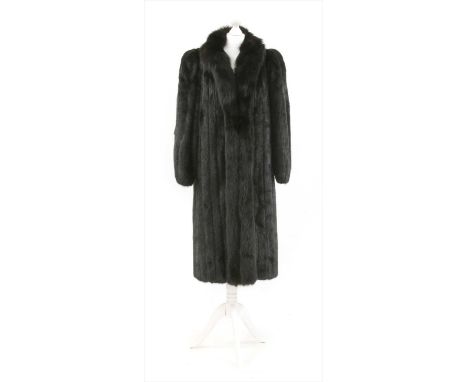 A full length mink fur coat with fox fur collar, discrete side pocket, hook closure, size not stated, approximate size 16