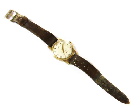 A gentlemen's 9ct gold Zenith mechanical strap watch, c.1960, 36mm diameter with a silvered dial, alternating baton hour mark