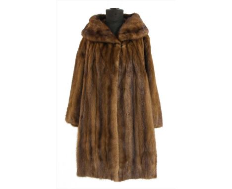 A brown mink fur coat, by Regal Furs, Toronto, with hook and loop closure, approximate size 14-16
