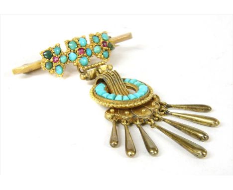 A gold ruby and turquoise brooch, three ruby and turquoise forget-me-not clusters applied to a knife edge bar brooch, with pl