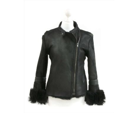 A Prada leather 'biker style' jacket, sheep fur lining, off-set front zip and press stud closure to neck, size not stated, ap