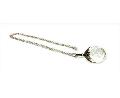 An Arts &amp; Crafts silver pendant, attributed to Bernard Instone, with a faceted paste briolette, later replacement , mount