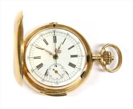 A Swiss gold hunter repeater chronograph pocket watch, 51mm diameter with engine turned decoration to the covers and vacant c