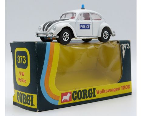 Corgi Toys diecast model VW Police Volkswagen 1200 with white and black body, red interior and blue light, 373, in original d