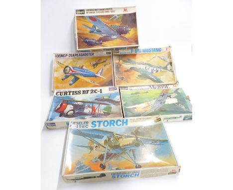 Six Hasegawa 1:32 scale model aeroplane kits including Curtiss BF 2C-1, Mitsubishi Type-Zero Zeke, North American P-500 Musta