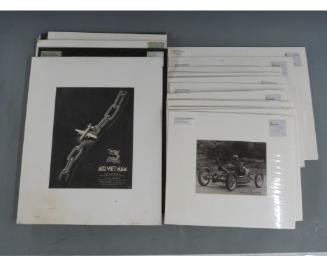 Approximately 25 mounted vintage motoring and similar interest prints and adverts, largest 50 x 38cm