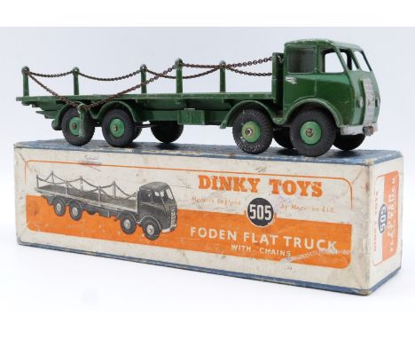 Dinky Toys diecast model Foden Flat Truck With Chains with green cab, bed, chassis and hubs, 505, in original box.&nbsp;