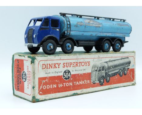 Dinky Supertoys diecast model Foden 14-Ton Tanker with dark blue cab, black chassis and pale blue tank and hubs, 504, in orig
