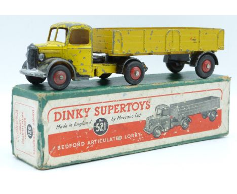 Dinky Supertoys diecast model Bedford Articulated Lorry with yellow cab and trailer and red hubs, 521, in original box.