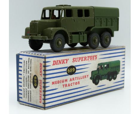Dinky Supertoys diecast model Medium Artillery Tractor with military green cab, chassis, cover and hubs, 689, in reproduction