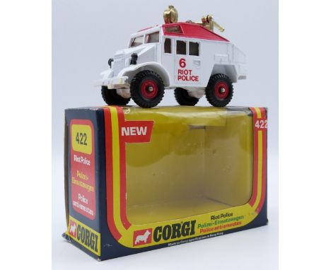 Corgi Toys diecast model Riot Police truck with white body, red roof and hubs and gold searchlight and water cannon, 422, in 