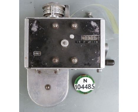 Setright bus ticket machine and a conductor's badge