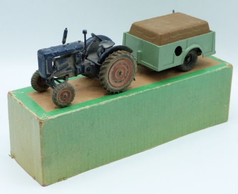 Britains Farm Issue clockwork diecast model set with Fordson Major tractor and trailer, in part original box.&nbsp;