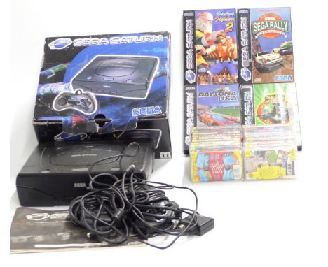 Sega Saturn video games console and four games including Sega Rally, Daytona USA etc together with 20 ZX Spectrum games, all 