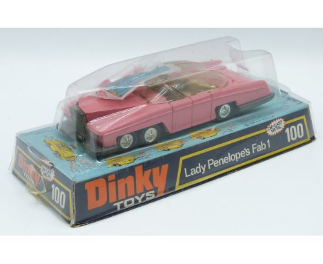 Dinky Toys diecast model Lady Panelope's Fab 1 with pink body, gold interior, figures and missiles, 100, in original bubble p