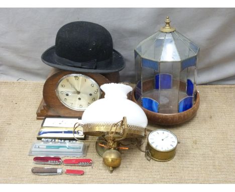 A leaded glass terrarium H33cm, together with a three train dual chiming mantel clock with Whittington and Westminster chime 