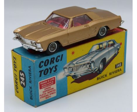 Corgi Toys diecast model Buick Riviera with gold body, red interior and silver hubs, 245, in original box.&nbsp;