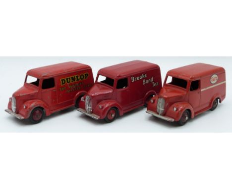 Three Dinky Toys diecast model Trojan delivery vans Brooke Bond Tea 455, Esso 450 and Dunlop The World's Master Tyre 451, all