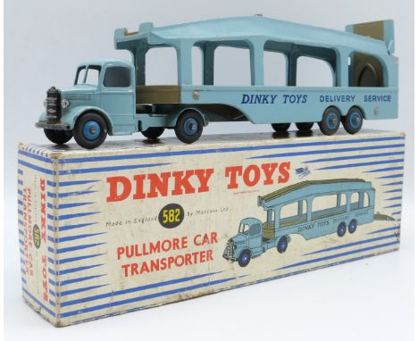 Dinky Toys diecast model Pullmore Car Transporter with pale blue cab and trailer, blue hubs and 'Dinky Toys Delivery Service'