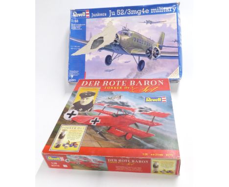 Two Revell model kits 1:28 scale Der Rote Baron Fokker Dr.1 15779 and 1:48 scale Junkers Ju 52/3mg4e Military 24521, both in 