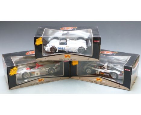 Three Maisto GT Racing 1:18 scale diecast model cars comprising BMW V12 LMR and Audi R8R Le Mans and R8 Le Mans-Sieger, all i