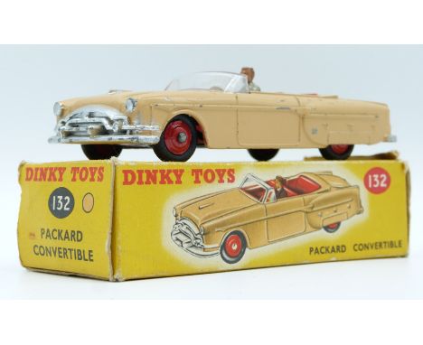 Dinky Toys diecast model Packard Convertible with beige body, driver, red interior and hubs, 132, in original box.