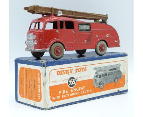 Dinky Toys diecast model Fire Engine With Extending Ladder, with red body and hubs, brown ladder and grey tyres, 555, in orig