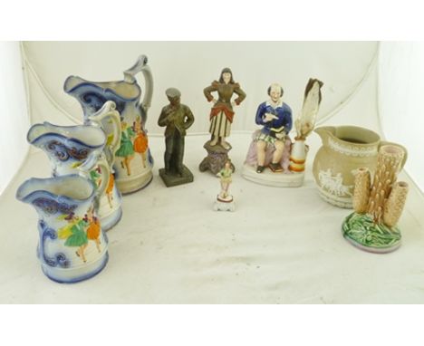 A CONTINENTAL CERAMIC FIGURINE 19cm high, together with A QUANTITY OF POTTERY JUGS and a STAFFORDSHIRE FIGURINE OF SHAKESPEAR