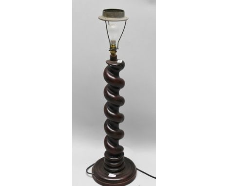 A SUBSTANTIAL TABLE LAMP formed from a barley twist column on a turned dish base, fitted shade 