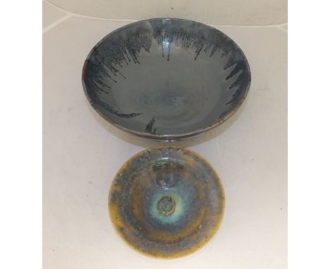 TWO STUDIO CERAMIC BOWLS in shades of blue glaze, largest 29cm high, smallest 17cm high 