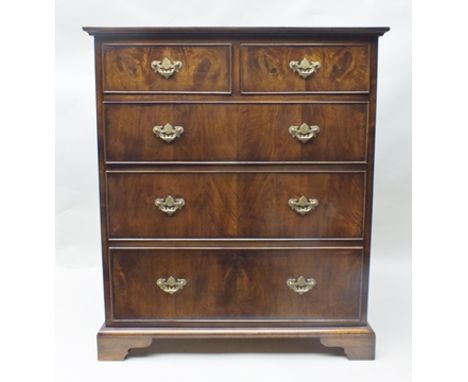 A LOCAL BE-SPOKE CRAFTSMAN MADE MAHOGANY CHEST OF FIVE DRAWERS having crossbanded top with two in-line and three graduating f