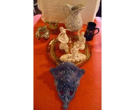 A MIXTURE OF ITEMS to include; an Italian red and gilt tea tray, ballet figures, pottery wall bracket, large blue and white m