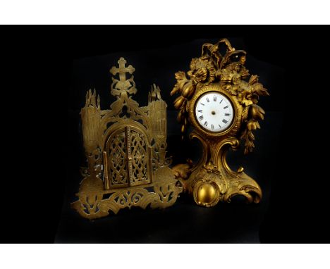 A 19th century ormolu table clock,  set with an early 19th century Robert Molyneux lever fusee pocket watch movement, 18cm hi