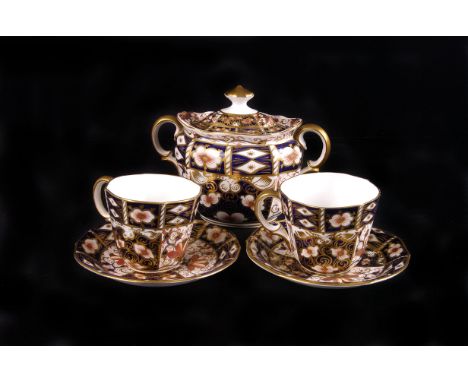 A Royal Crown Derby Imari pattern part tea service, 11 pieces, AF
Four cups and saucers (one cup badly cracked and repaired),