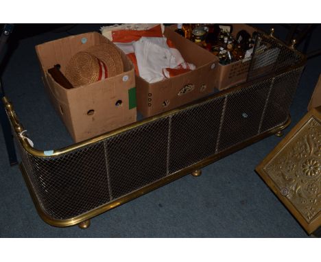A brass framed fire screen,  66cm high, together with a brass bordered fire guard (2) 