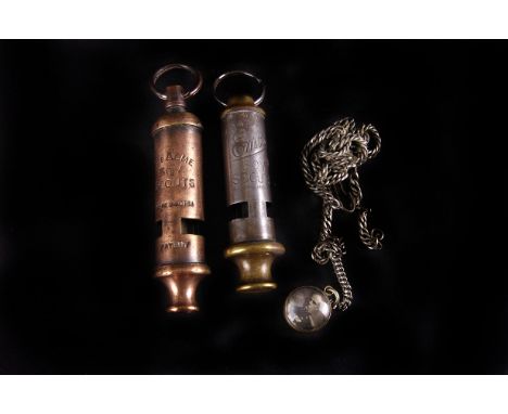 OF BOY SCOUT INTEREST: an early 20th century 'Acme' copper whistle,  together with another, and a Baden Powell/Lord Roberts l