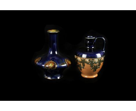 Two early 20th century Doulton Lambeth Secessionist stoneware miniatures,  the first with compressed baluster form, with appl