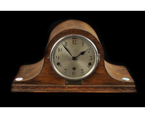 A late Victorian black slate and marble mantle clock,  with central circular brass dial and enamel chapter ring, chiming on c