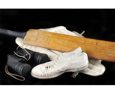 Cricket equipment, including three wooden bats, shin pads, and shoes, in a leather holdall, together with two pairs of binocu