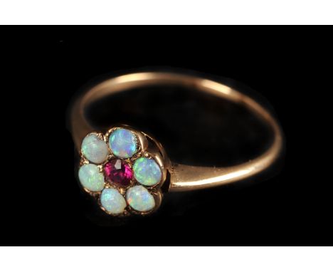 An opal and ruby daisy cluster ring,  finger size P