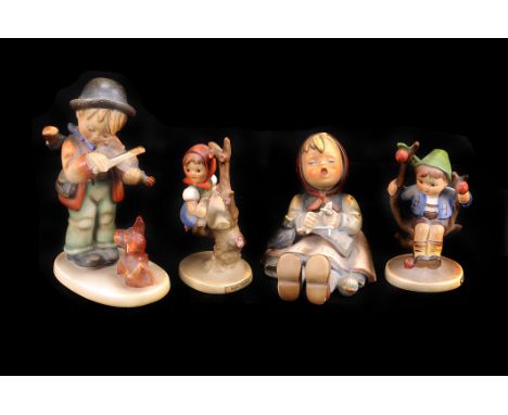 Four German Goebel figures,  including 'Apple Tree Boy and Girl' pair, 'The Singing Knitter', and 'The Young Fiddler'