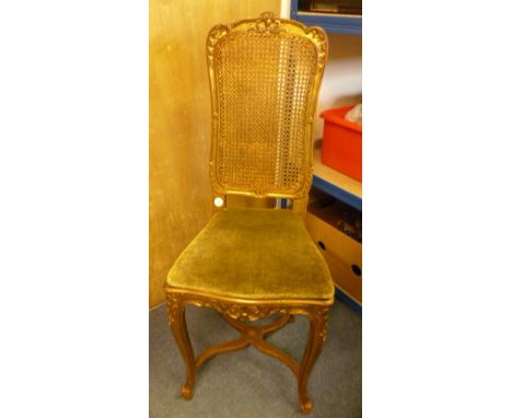 A gold coloured French style hall chair,  with caned back and seat, with tie-on green velvet cover, 101cm high