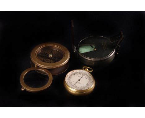 A 19th century gilt brass pocket aneroid barometer by J. Lizars, Glasgow, functioning, together with three 20th century compa