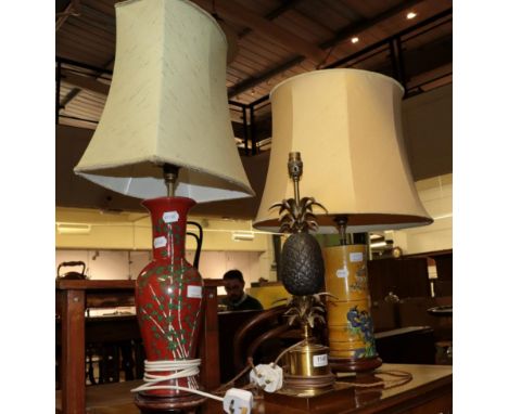 A patinated and gilt bronze table lamp in the form of a pineapple, together with two ceramic oriental style table lamps (3) 