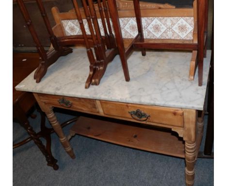 ~ A late Victorian pine marble top and tile back washstand with two drawers above spindle turned legs joined by a shelf ,109c